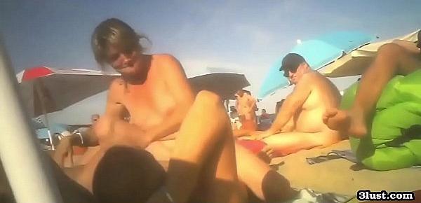  Danish couple fucking on a nudist beach